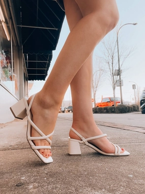  Women Slip Into Style Heels In Bone